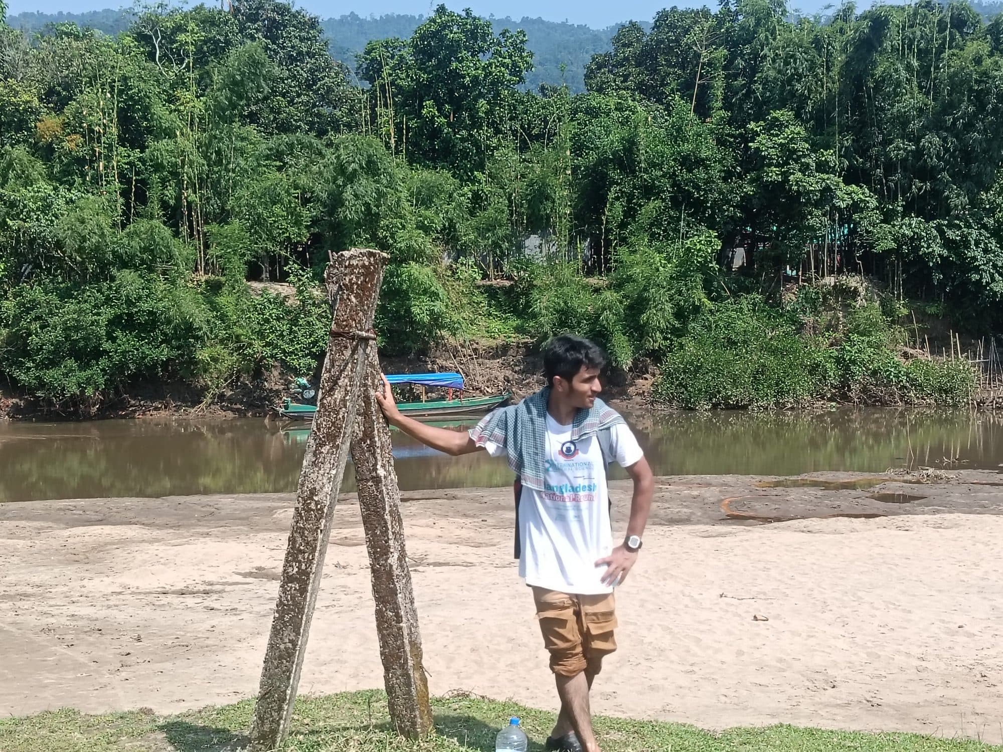 Mohammad Nasir on a sandy riverbank in Sylhet