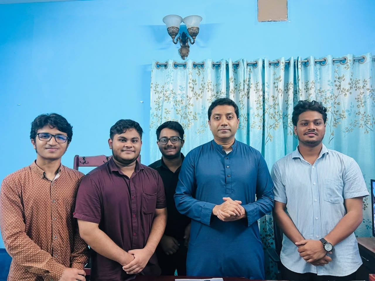 Mohammad Nasir and the General Science Olympiad team with Bobby Hajjaj, State Minister for Education of Bangladesh